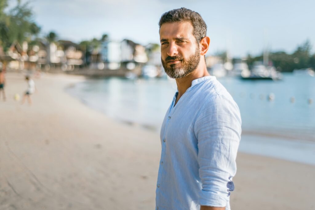 man experiencing andropause symptoms, contemplative outdoors