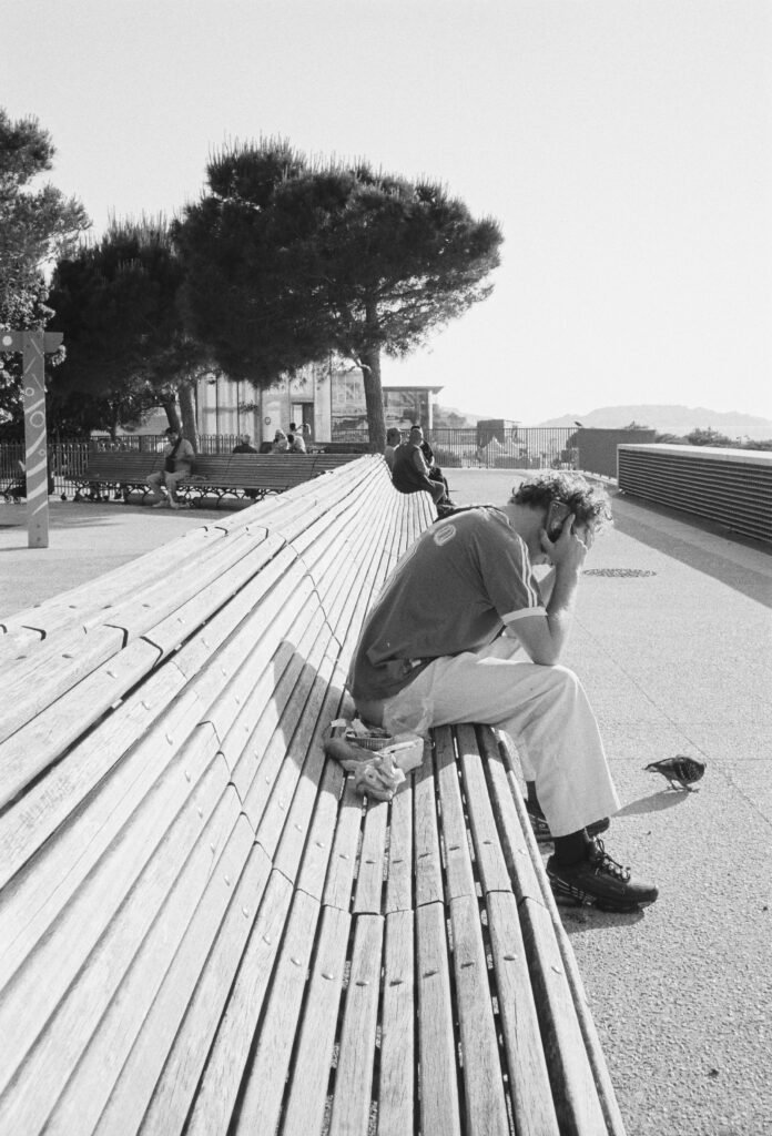 Man sitting alone showing anxiety symptoms in men