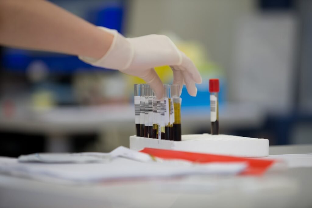Blood test tube representing the blood tests men should get by age