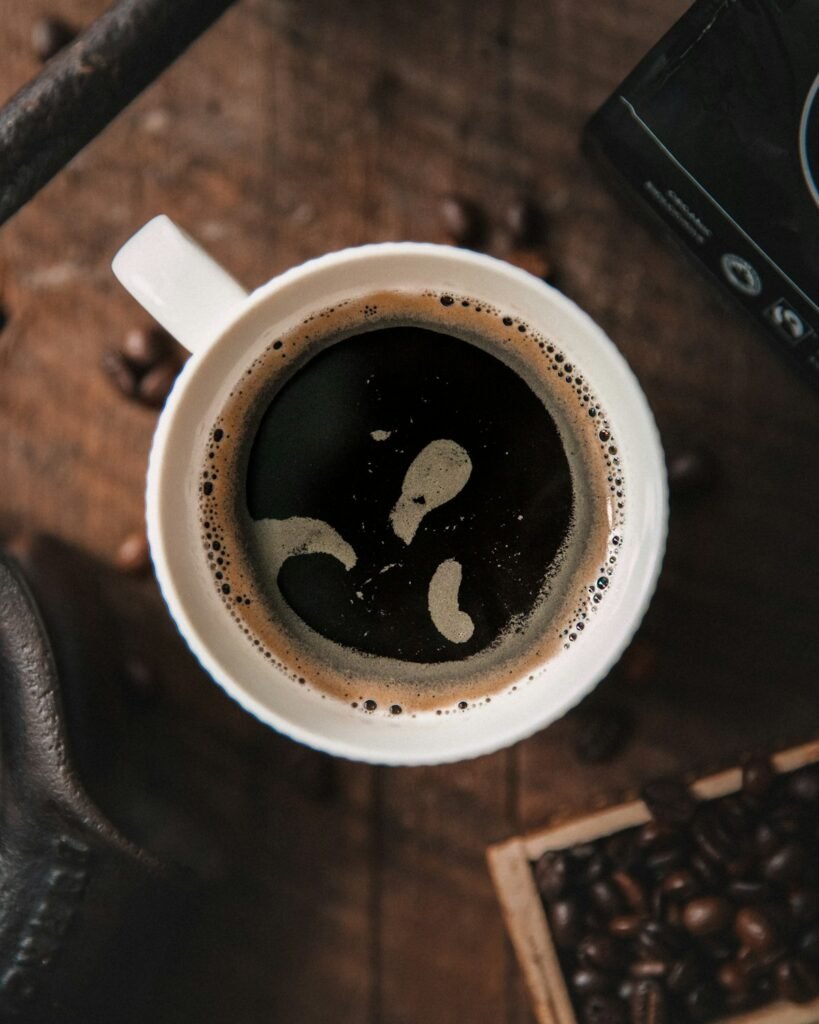 cup of black coffee showing caffeine benefits and risks