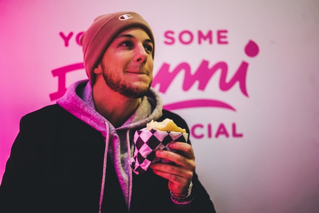 Man enjoying one of his planned cheat meals without guilt