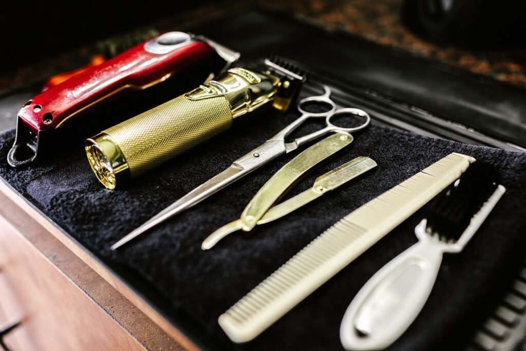 Barber clippers and grooming tools on a tray