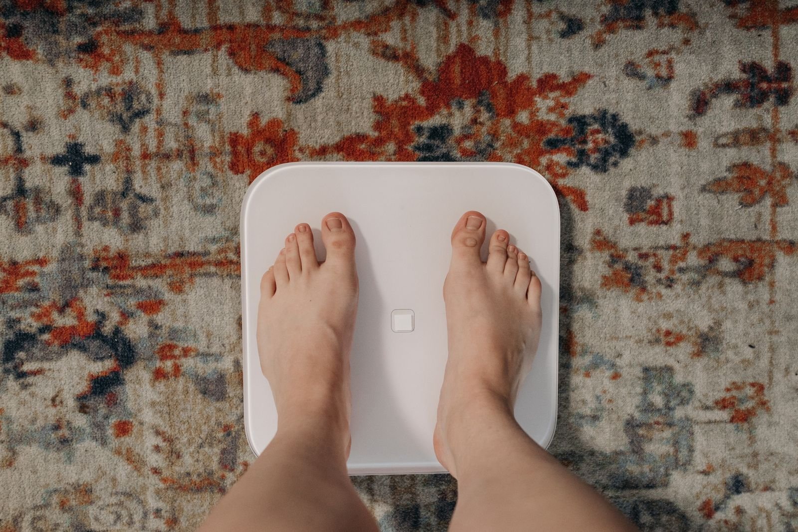 Bare feet on a smart bathroom scale