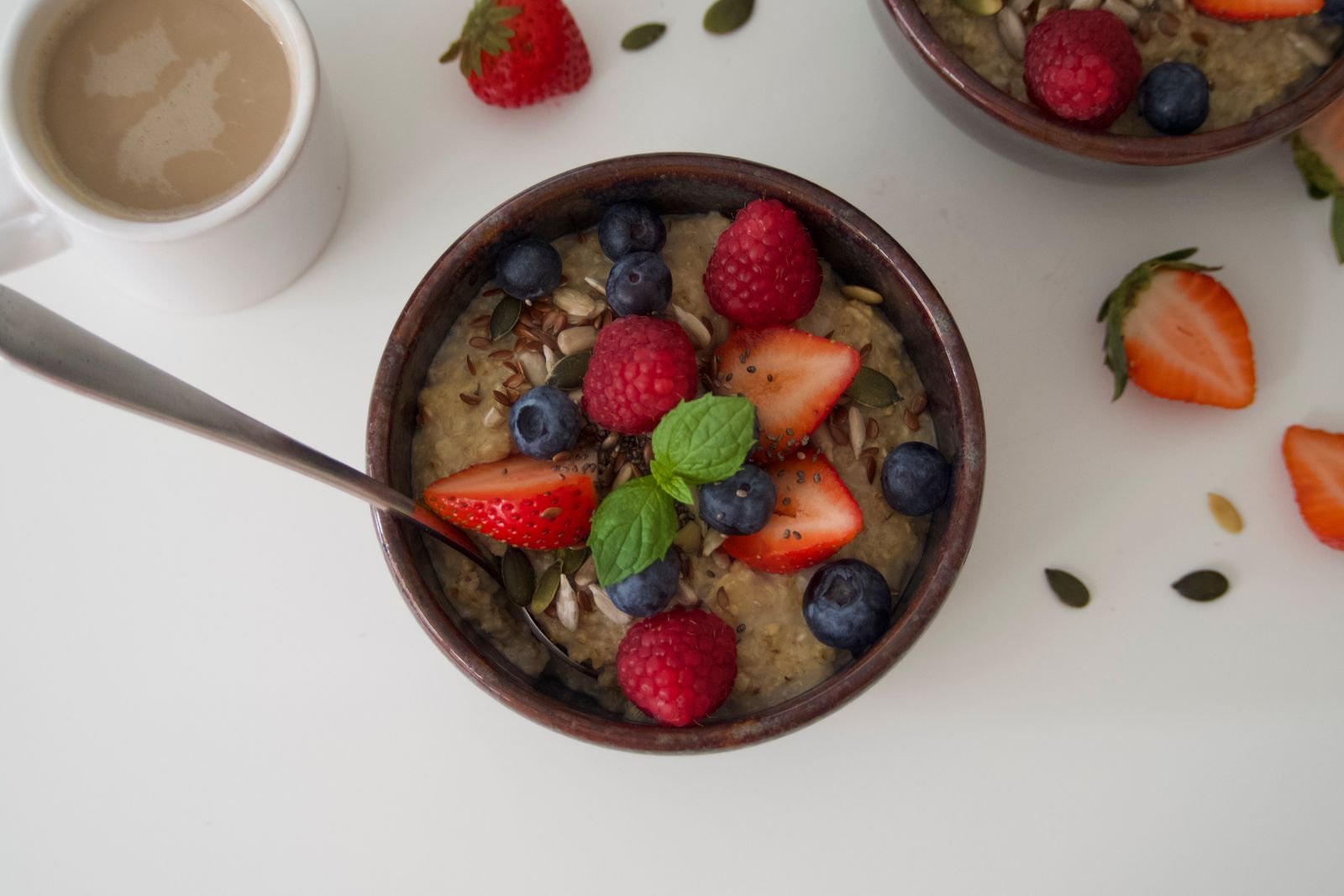 Bowl of oatmeal topped with fresh berries