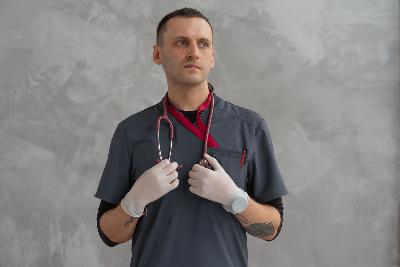 Clinician standing with a stethoscope around his neck