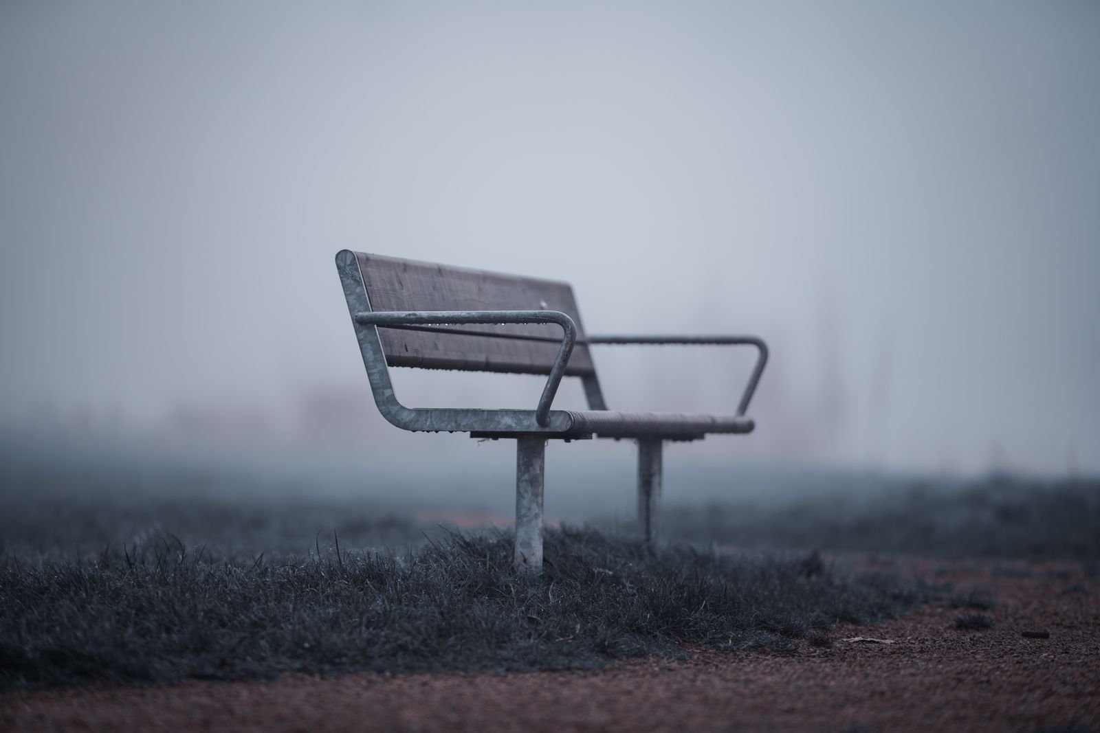 Empty bench in the fog