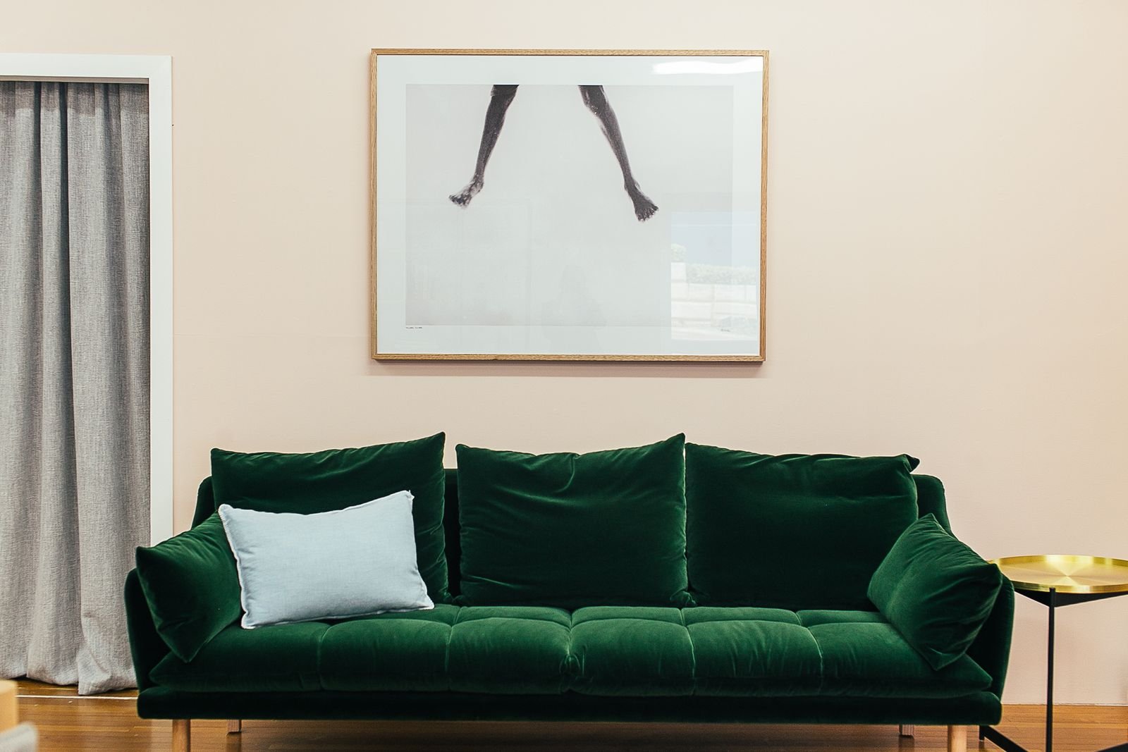 Empty green sofa in a living room