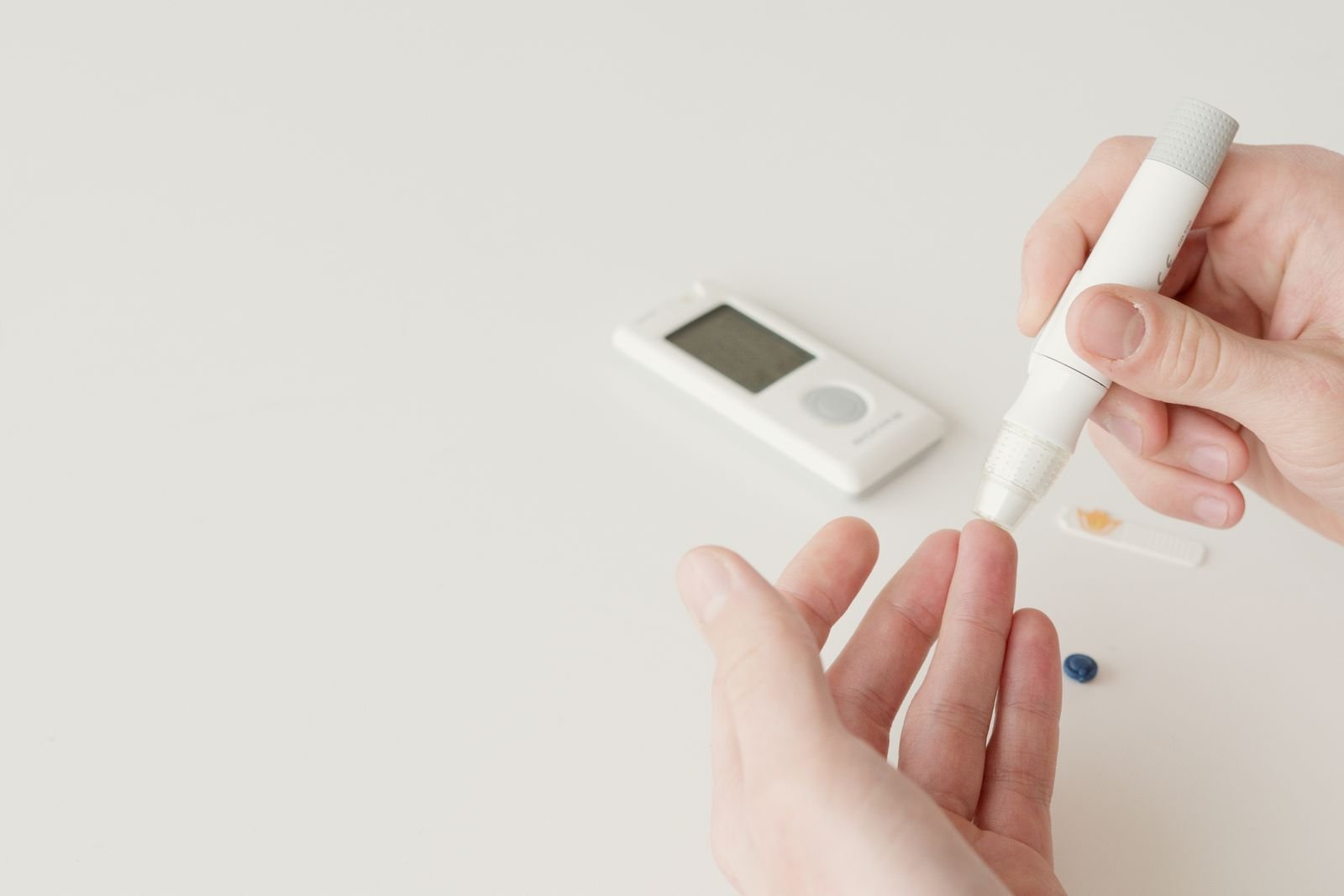 Finger-prick blood sugar test with a glucose meter