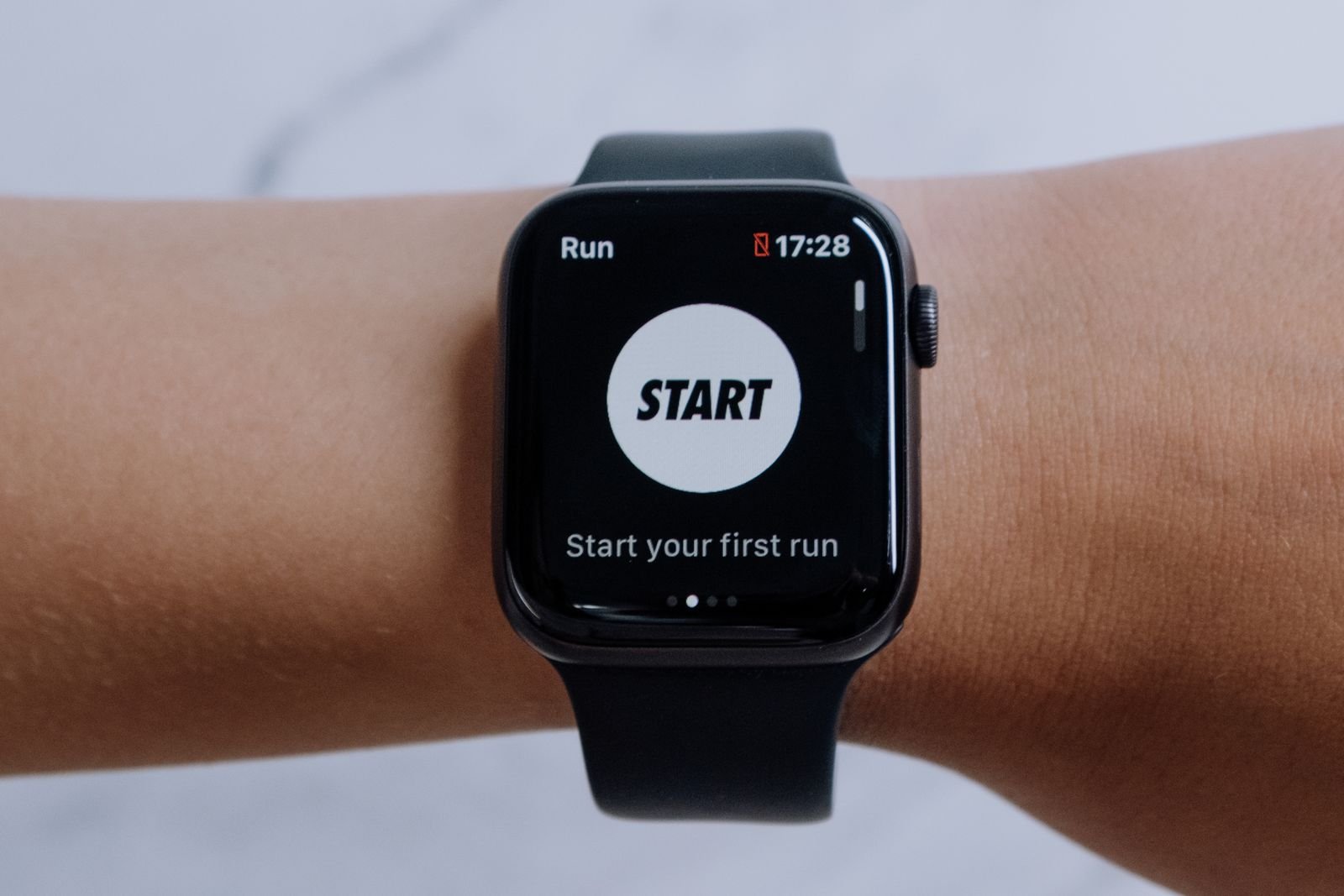 Fitness watch on a wrist ready to start a session