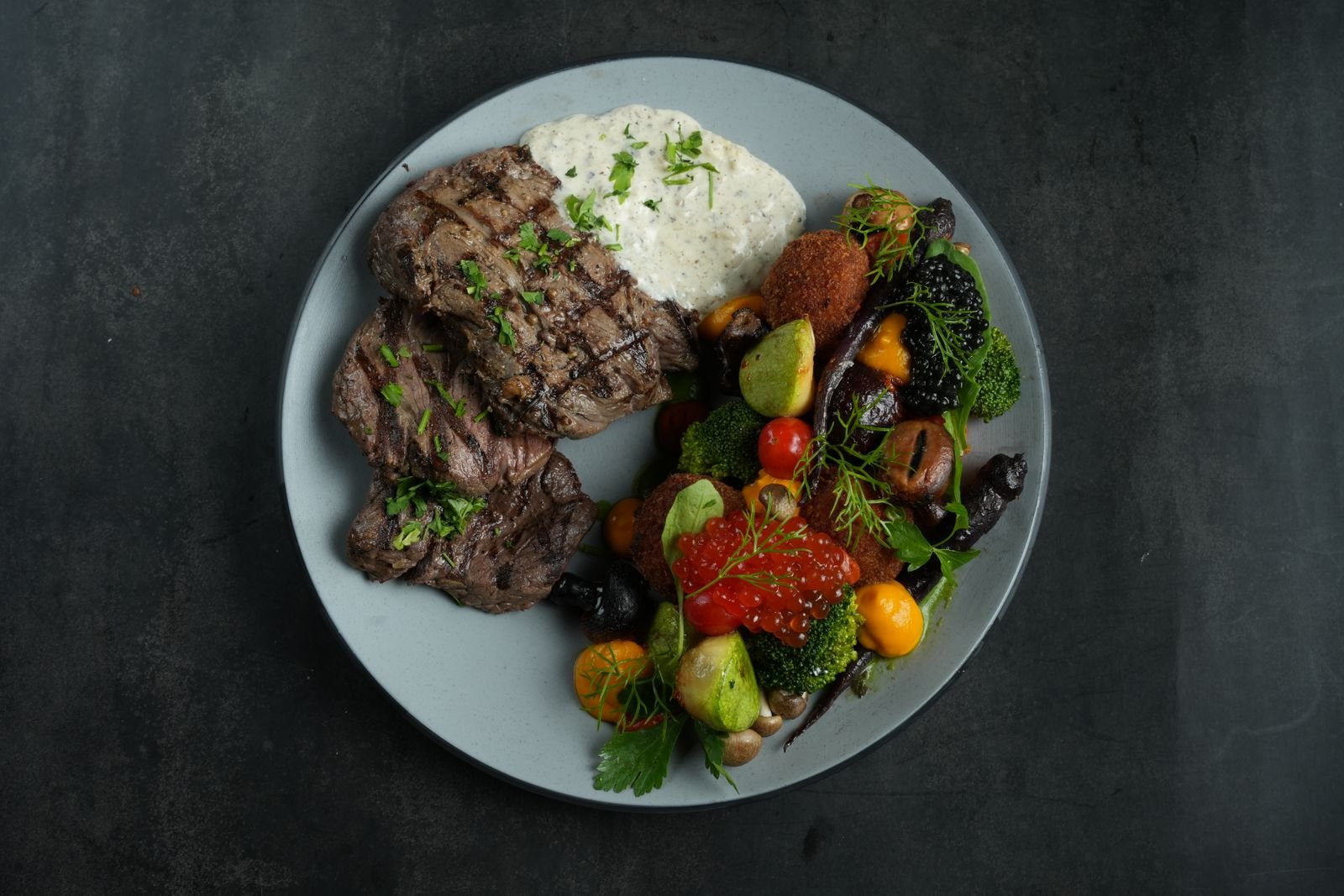 Grilled beef steak with mixed vegetables