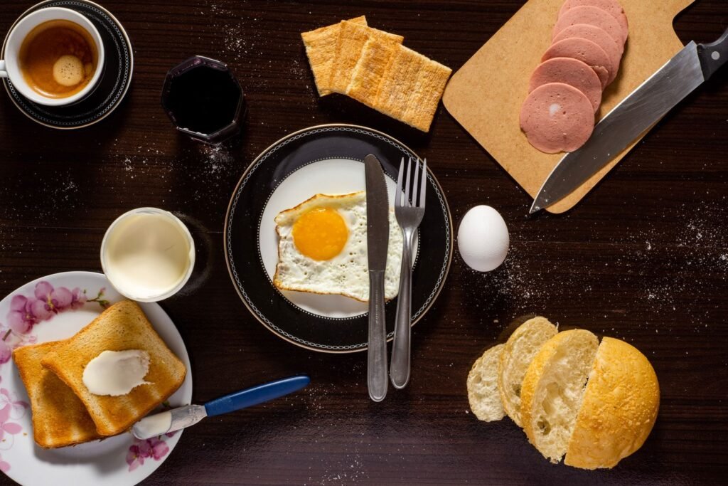 Breakfast spread with eggs, toast and coffee
