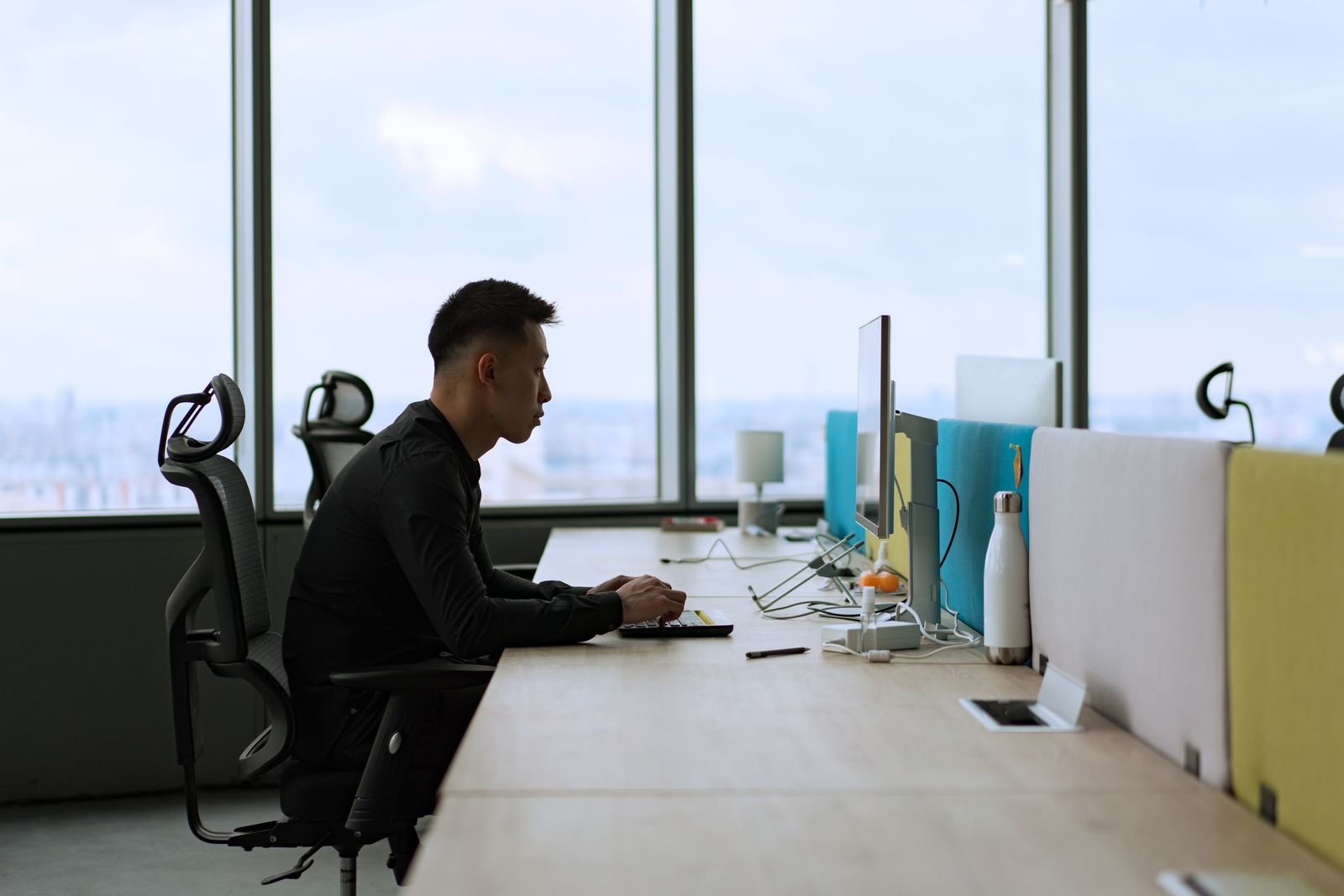 Man working at a computer in an office