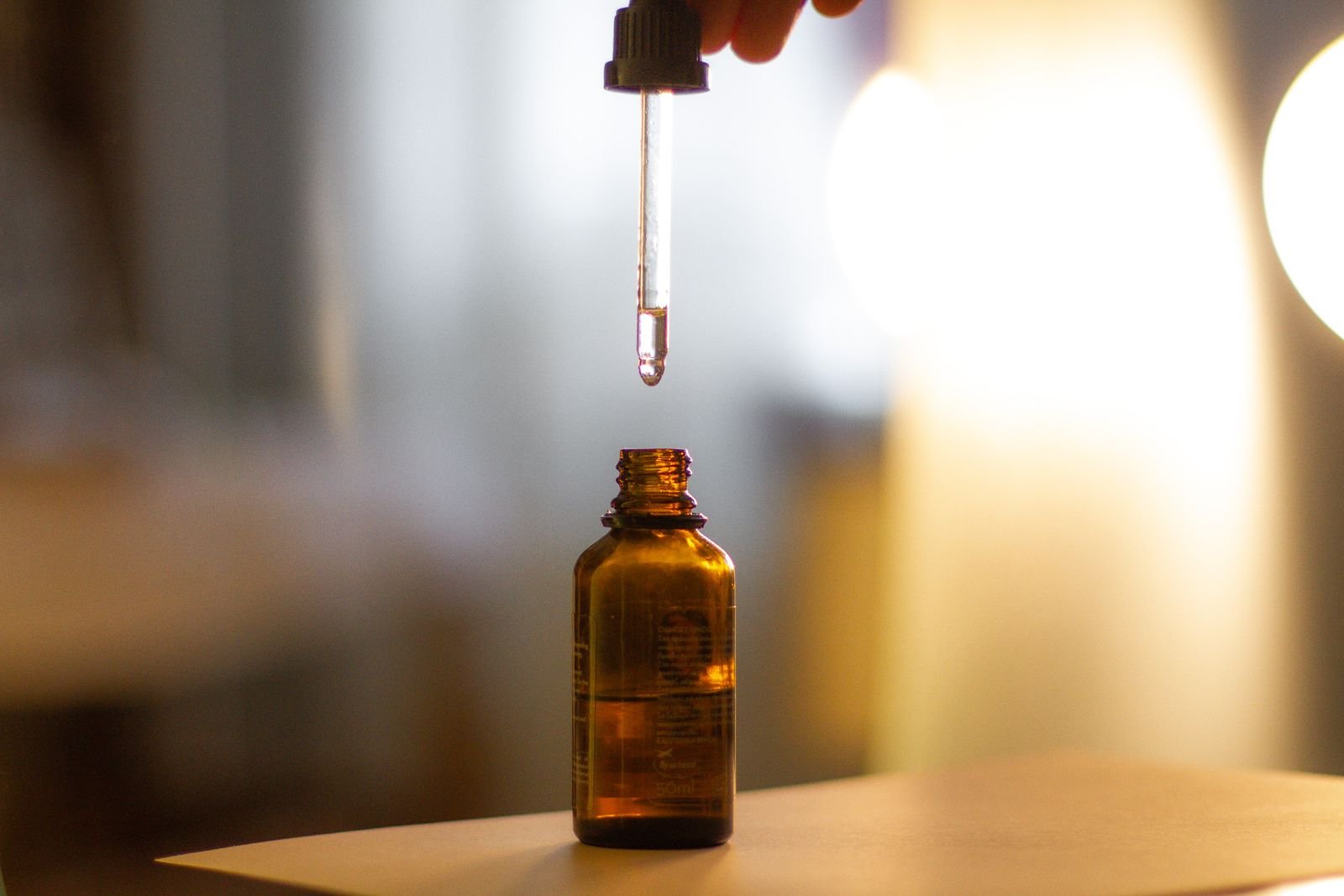 Minoxidil dropper bottle, often used alongside finasteride