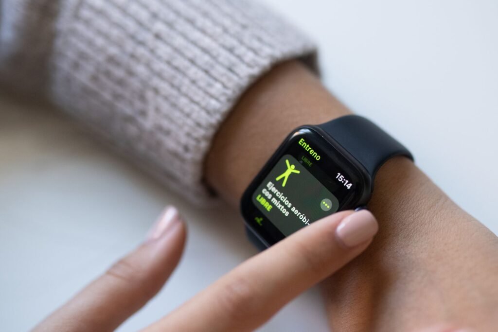 Smartwatch showing heart-rate data on a wrist
