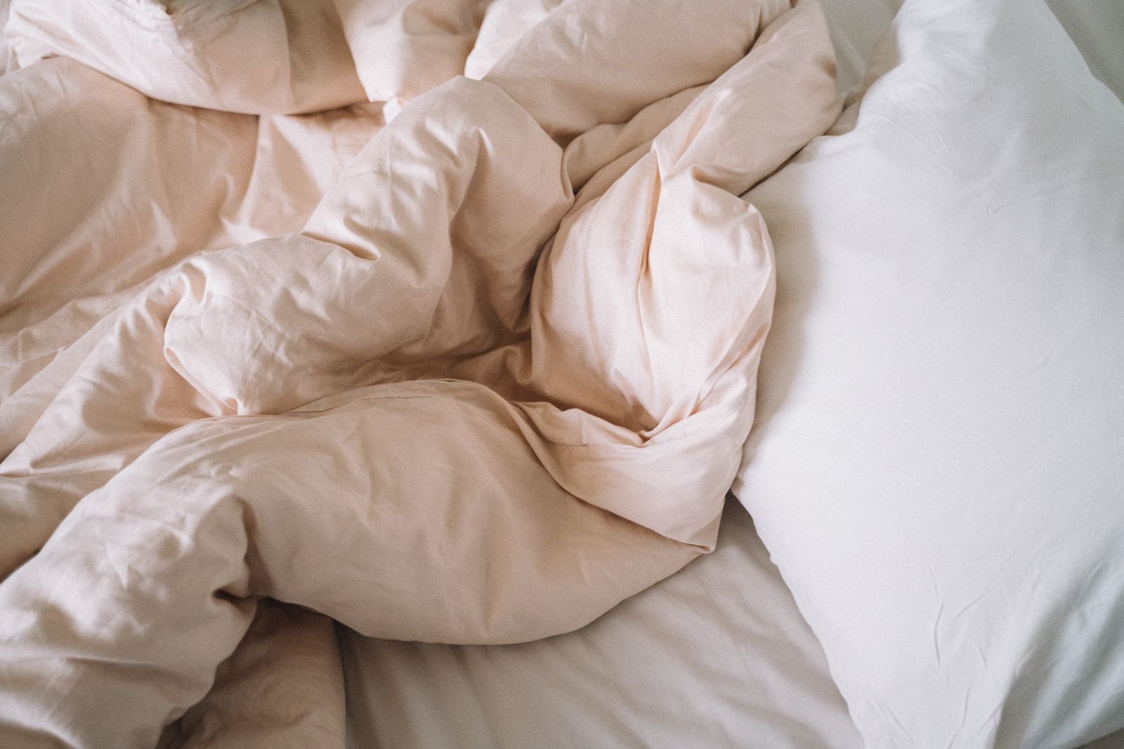 Rumpled white bedding