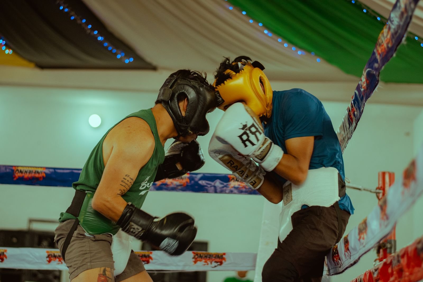 Two men sparring in a boxing ring