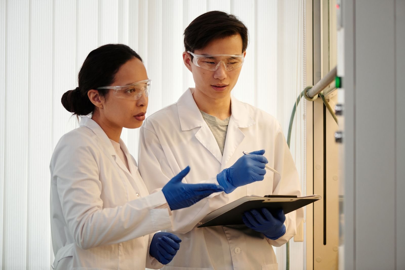 Two scientists reviewing results in a laboratory