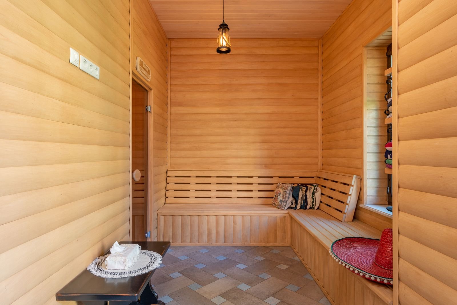 Warm wooden sauna interior with benches