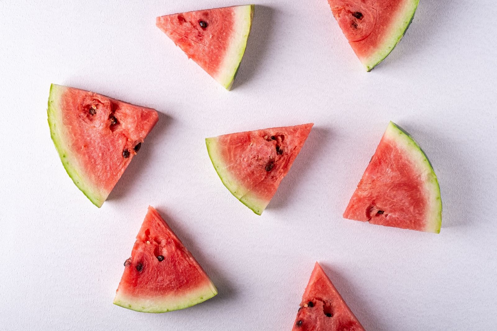 Watermelon slices on a white background